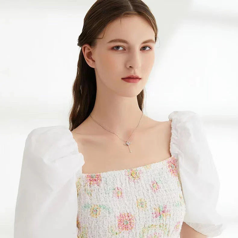 Captivating Cupid Heart Necklace with Fluttering Angel Wings, Crafted from Premium Titanium Steel and Adorned with Shimmering Zircon Crystals