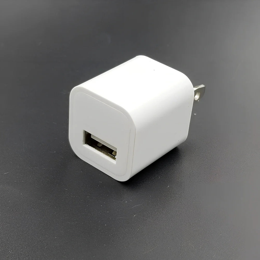 USB electric fly trap in white with blue accents, showing five bait grooves and rotating capture plate for insect control