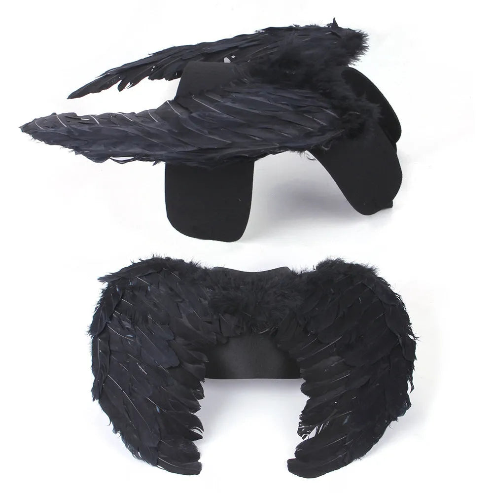 Black and white angel wings costume for dog or cat, made of felt fabric.