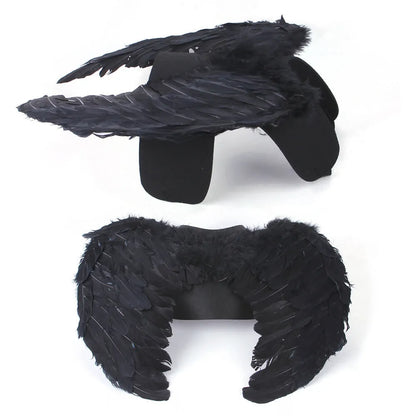 Black and white angel wings costume for dog or cat, made of felt fabric.