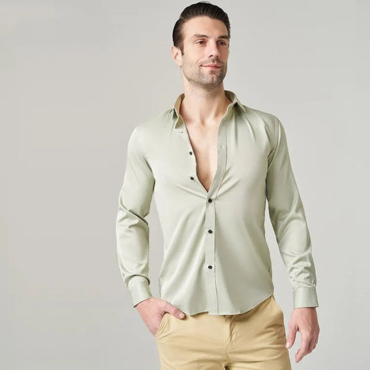 Men's stretch long sleeve work shirt in polyester, available in multiple colours and sizes S to 3XL for weights 70-130kg.