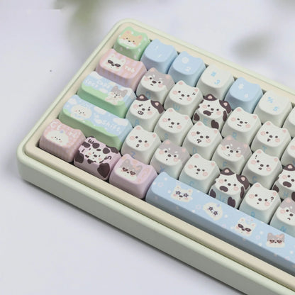 Full set of PBT key caps with sublimated cat and puppy design for mechanical keyboards.