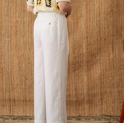 Linen high-waisted trousers with an elasticated waistband and loose straight-leg cut in greige colour