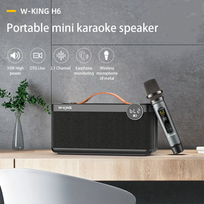 Black portable Bluetooth speaker with microphone, 215.3 x 86.3 x 109mm, USB charging, for calls and music