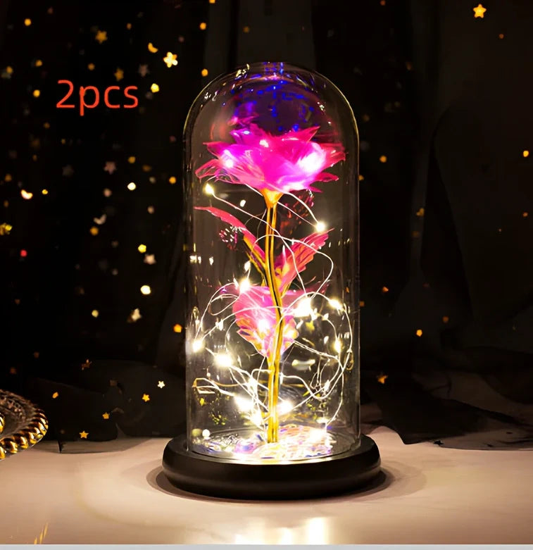 Little Prince rose arrangement under 20x9cm glass dome with gold foil flowers