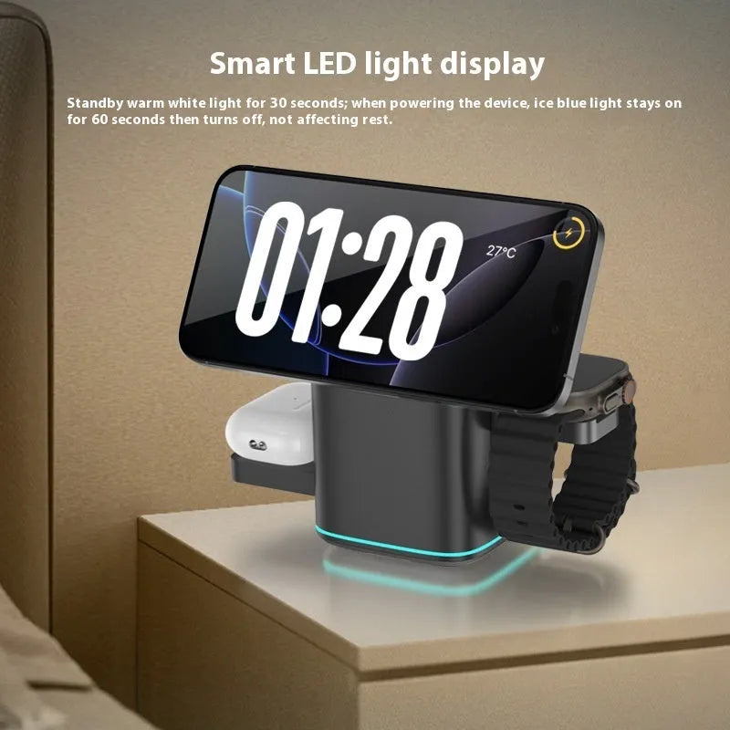 Black magnetic wireless phone charging stand on a desk, rotated to a landscape viewing angle.