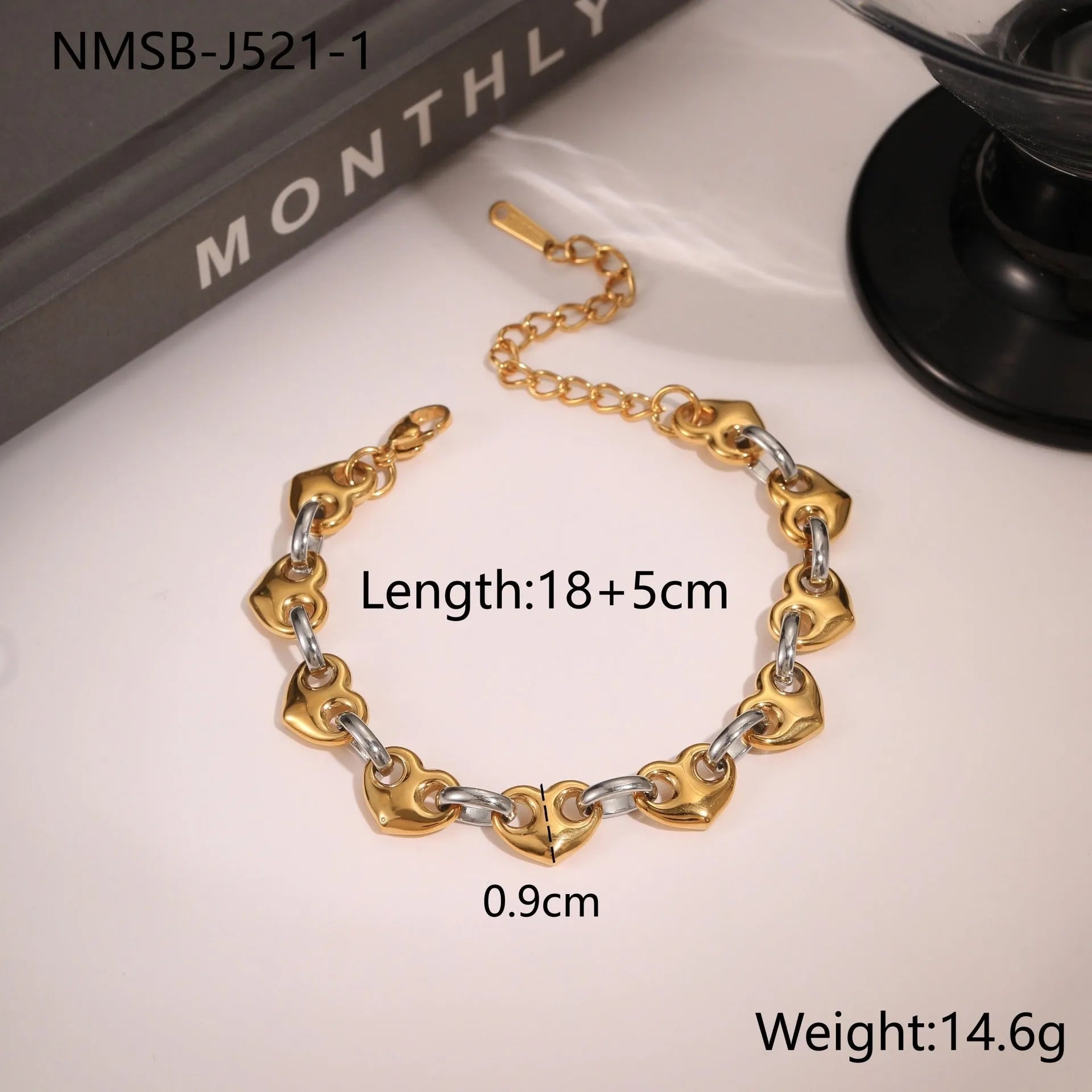 Women's hollow heart bracelet in stainless steel with 18K gold plating, shown in colour block, gold, and steel finishes