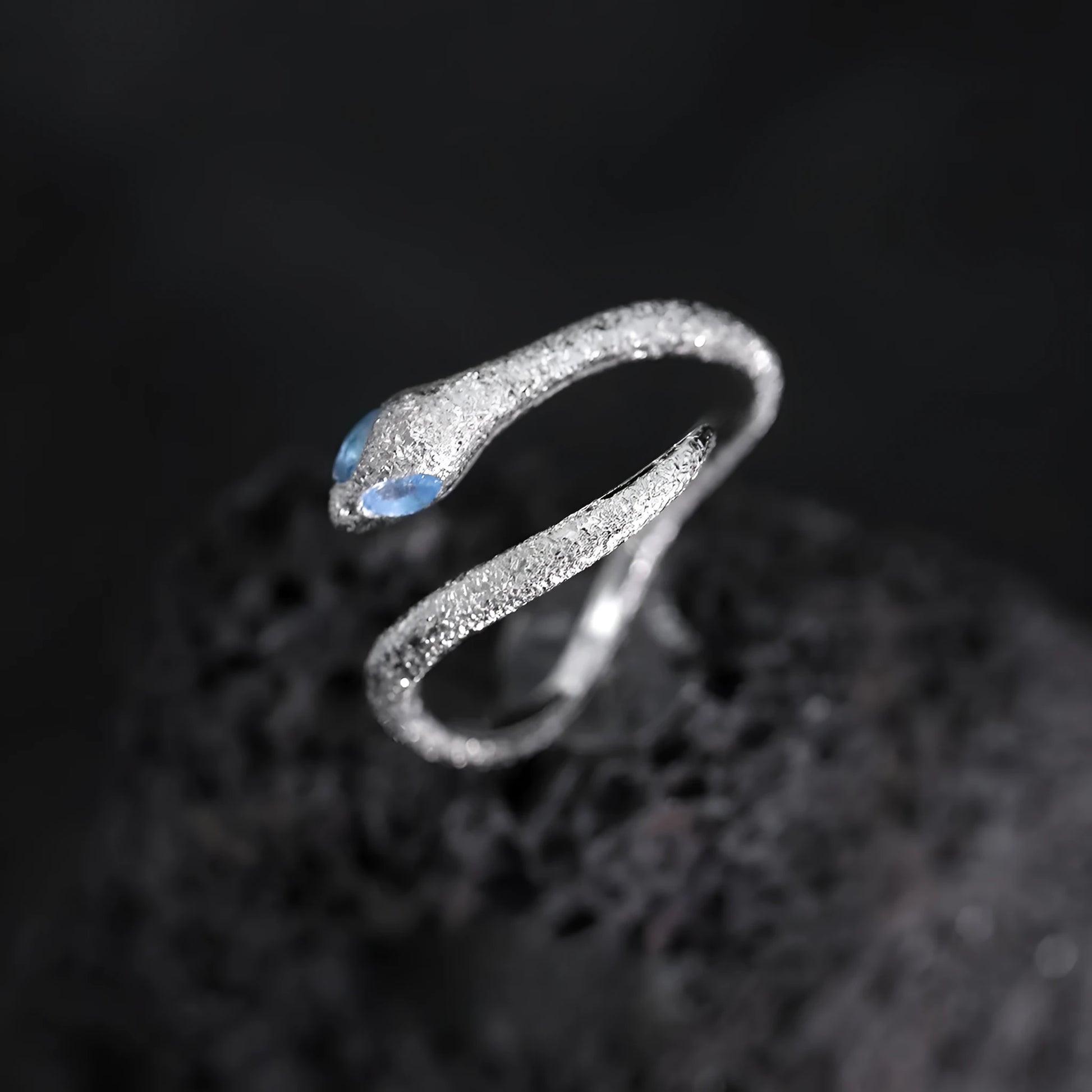 Cool Style Minority adjustable silver snake ring with platinum-colour finish on a hand, showing detailed modelling and open band.