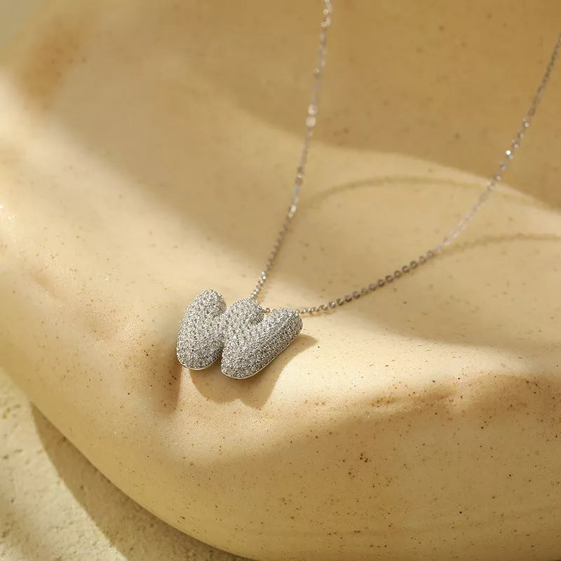 Stainless steel initial pendant necklace with zircon accents, personalized with your choice of letter.