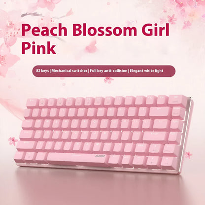 Pink mechanical keyboard with 82 keys and white backlight illumination on a desk.