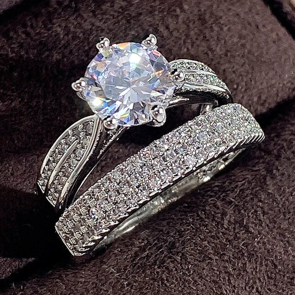 White gold colour combined ring bracelet with geometric design and round elements, showing size options 5-11