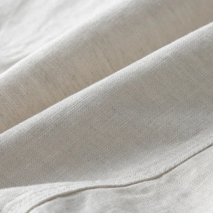 Men's loose fit linen suit jacket in solid colours showing long sleeves and casual styling