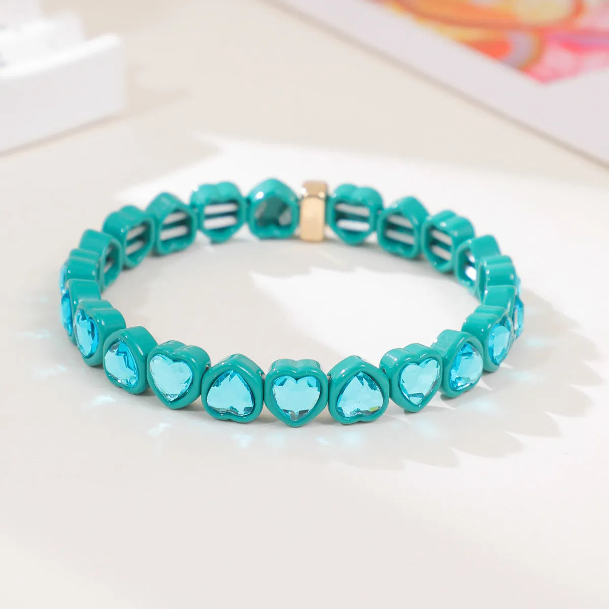 Rainbow enamel heart-shaped stretch bracelet in alloy with diamond process surface