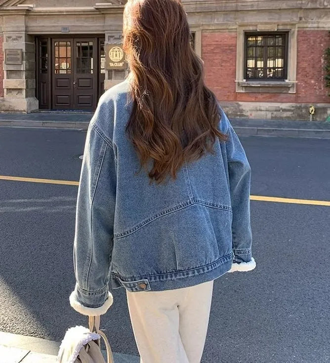 Loose salt-style sleeveless A-line jacket top for women in blue cotton with white fur trim, sizes S to XL