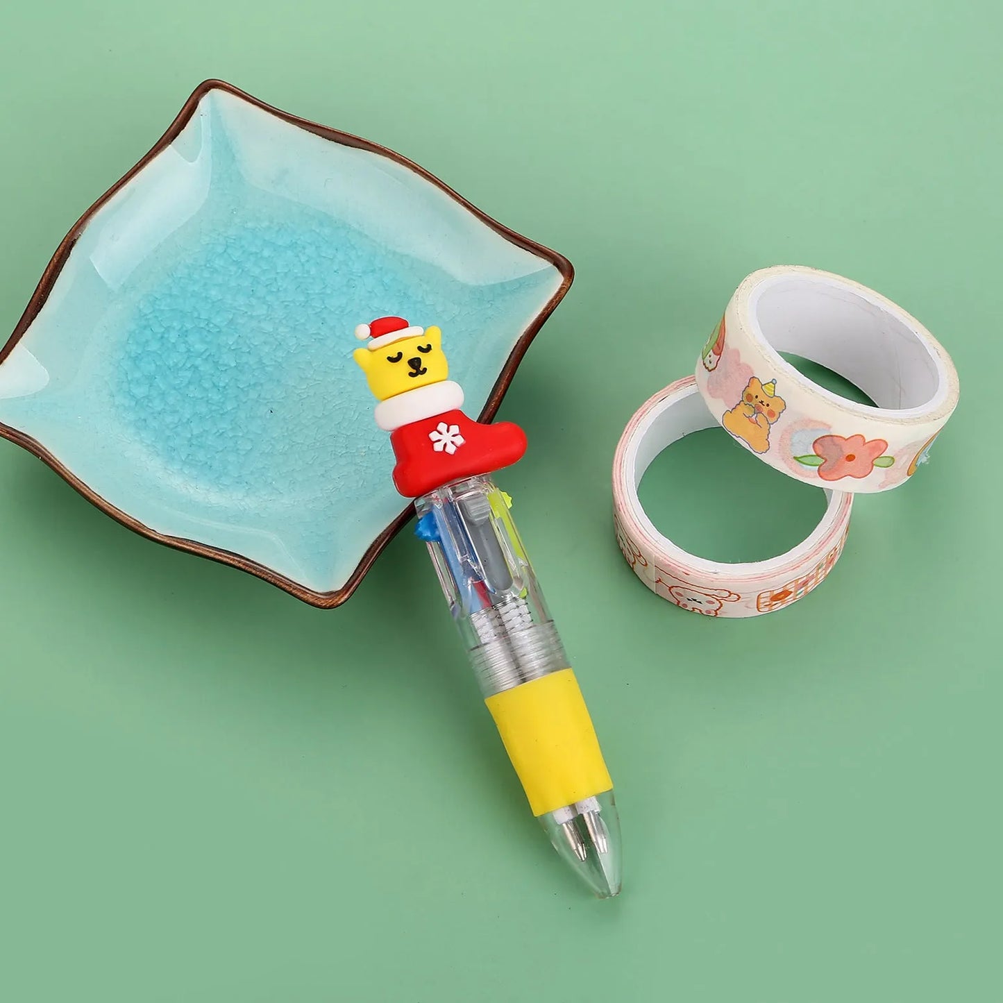 Christmas four-colour ballpoint pen with press mechanism showing festive designs
