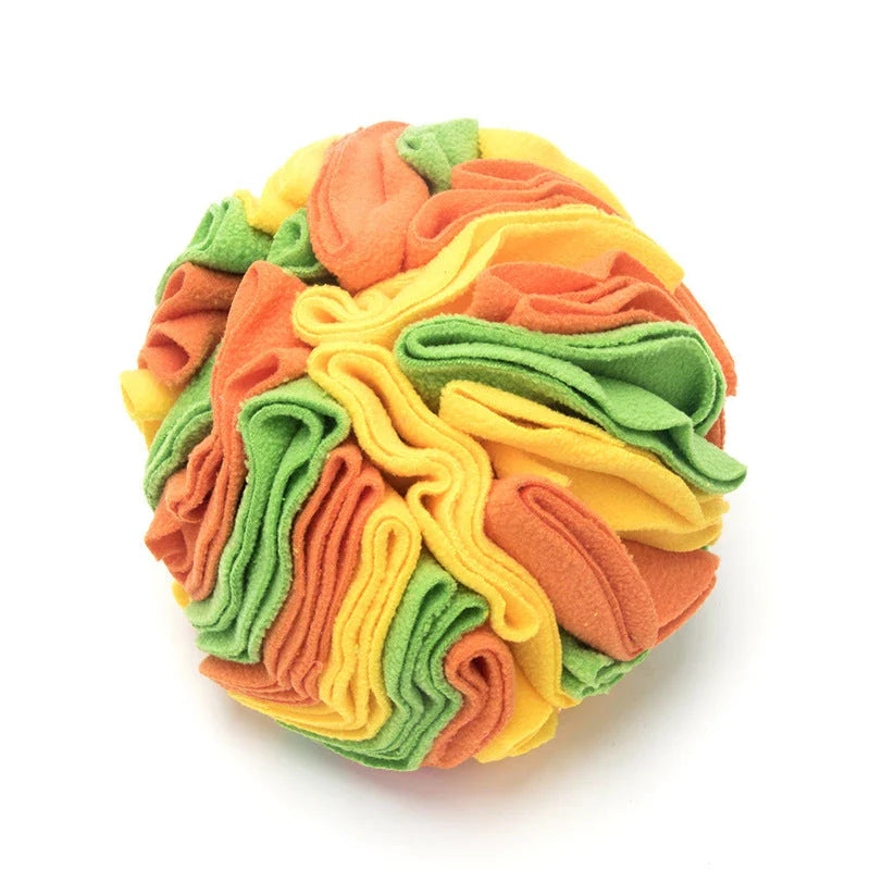Soft and interactive puzzle ball toy made of polar fleece for dogs and cats to sniff and forage for hidden treats