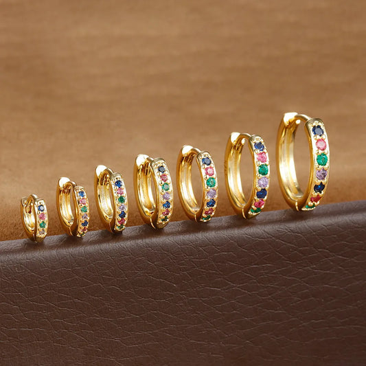 Circle zircon perforated stud earrings in gold, rose gold, silver colours with geometric design and multiple size options