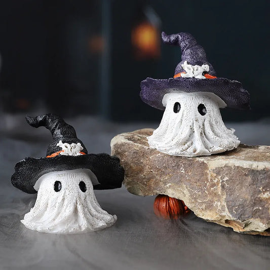 Resin wizard hat holiday ornaments in black and purple colours for Halloween and Christmas decorations