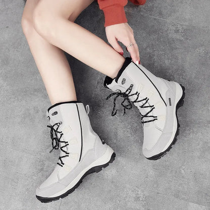 Women's mid-calf thermal snow boots in black with genuine leather upper and rubber sole for winter