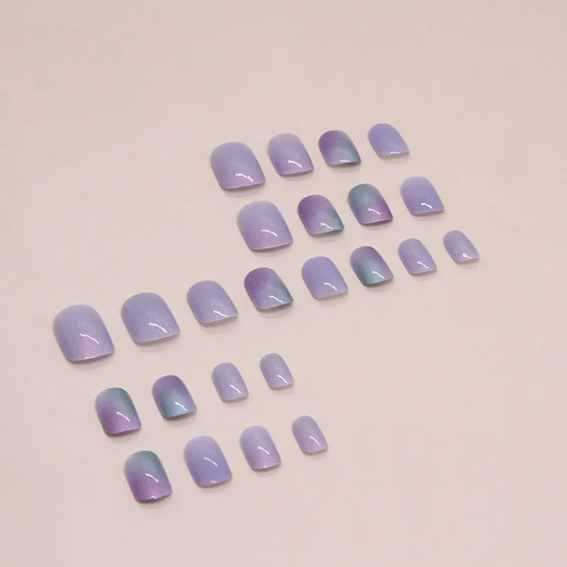 Short aurora fake nails with bright starry sky glitter pattern, 24-piece set with adhesive glue