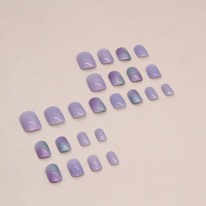 Short aurora fake nails with bright starry sky glitter pattern, 24-piece set with adhesive glue