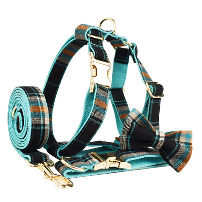 Green retro style cloth dog collar, lead, vest, and bow set displayed together.