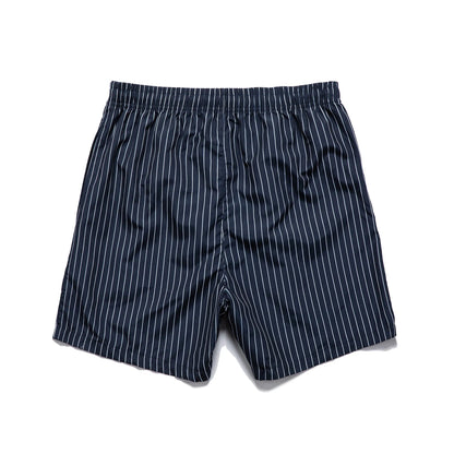Pair of grey striped polyester shorts with a straight leg cut on a mannequin