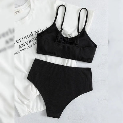 Black women's bikini with high waist and sling split design, shown as a two-piece set.
