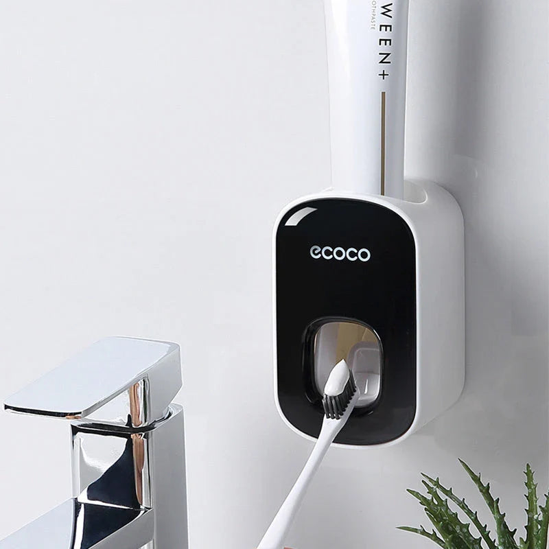 Wall-mounted automatic toothpaste dispenser with toothbrush holder and storage organizer, available in black and grey colors
