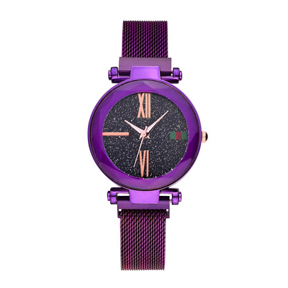 Rose gold ladies watch with round 32mm dial and magnetic stainless steel jewellery clasp on wrist.