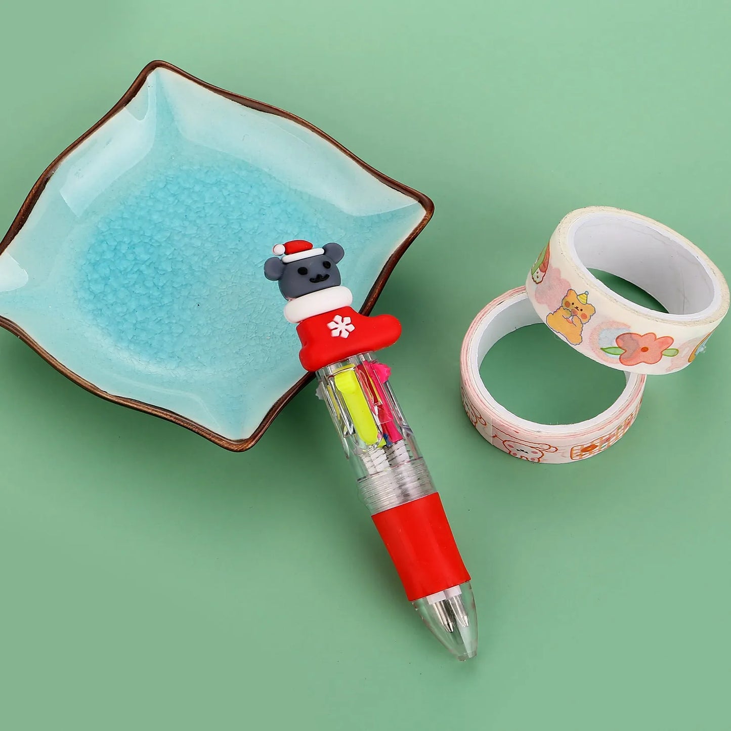Christmas four-colour ballpoint pen with press mechanism showing festive designs