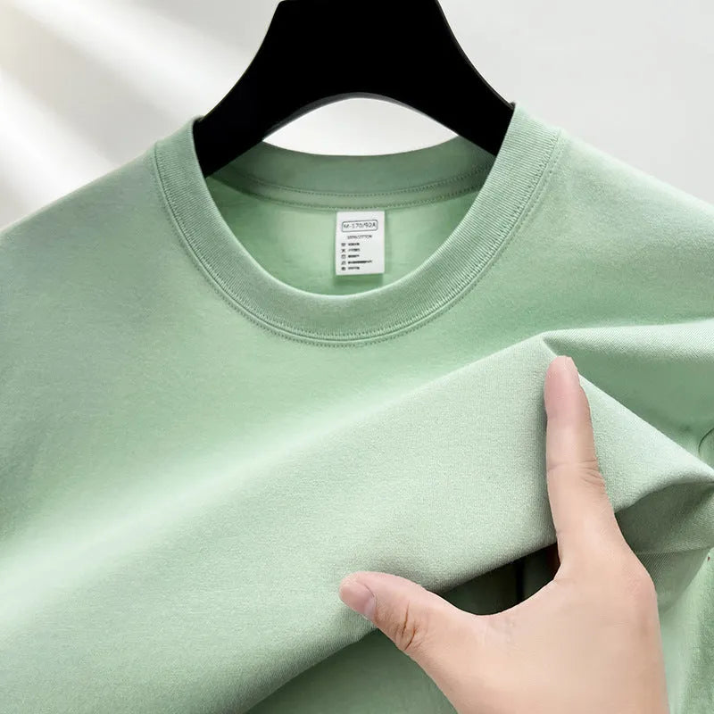 Men's drop shoulder t-shirt in thin cotton fabric, shown in a solid colour.