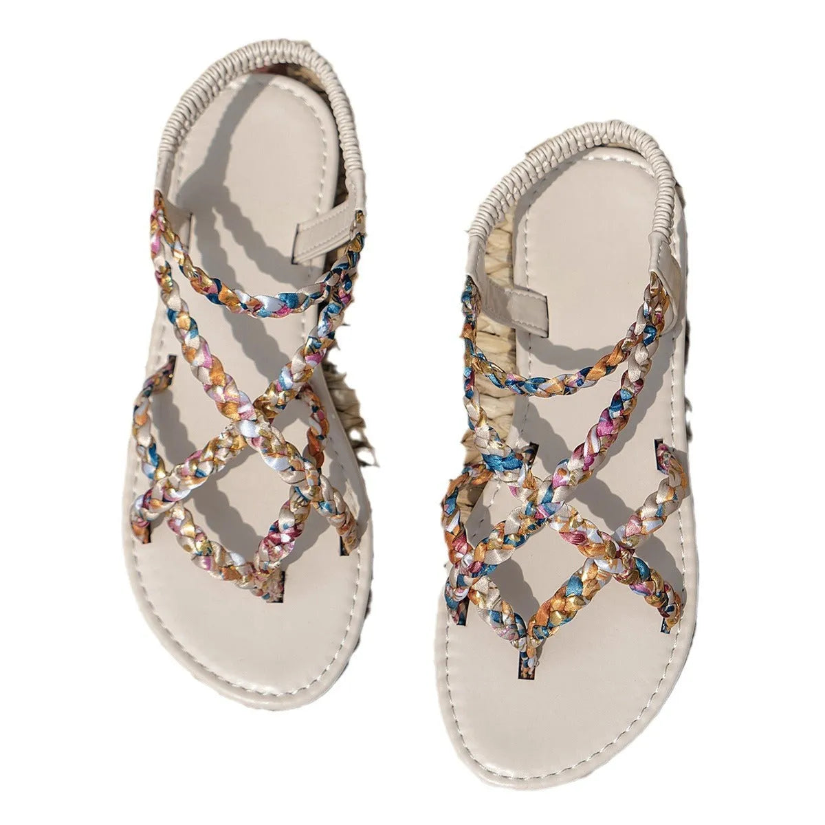 Women's flat sandals with elastic band and cloth upper in black and white colour options