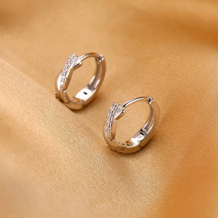 Gold geometric interwoven earrings with 1.5cm diameter hemp rope pattern and diamond-treated copper surface