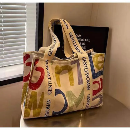 Canvas women's travel tote bag with printed patterns and shoulder straps