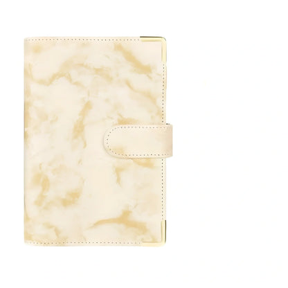 A6 leather PU binder journal open showing colour budget sheets and zip pockets with spiral binding