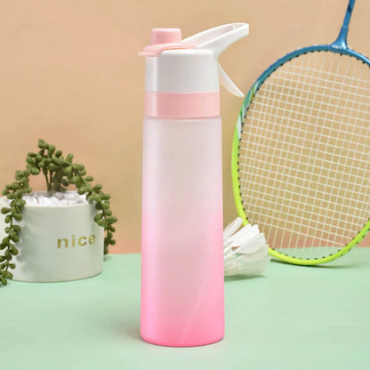 Large plastic spray water bottle with handle strap and leakproof lid in green colour.