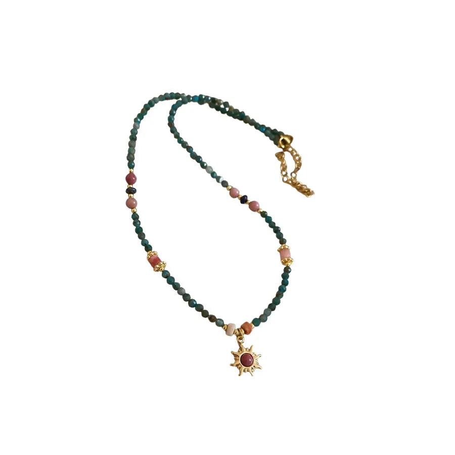 French court style freshwater pearl necklace with stone sun pendant on clavicle chain