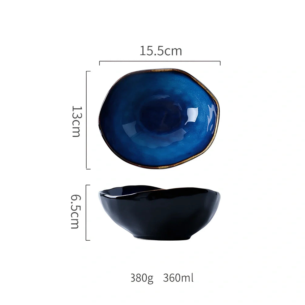Blue irregular ceramic plate with kiln-changing glaze pattern, measuring approximately 20cm across irregular edges