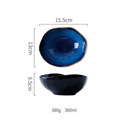 Blue irregular ceramic plate with kiln-changing glaze pattern, measuring approximately 20cm across irregular edges