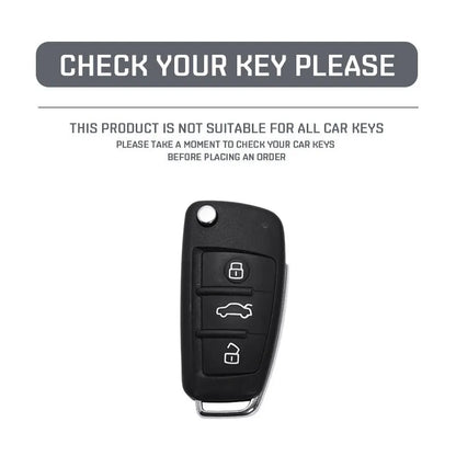 Carbon fibre style car key cover with a mirrored surface element, shown in black and white.