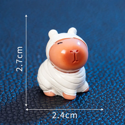 Eight Halloween character capybara resin decorations including pumpkin, zombie and vampire designs