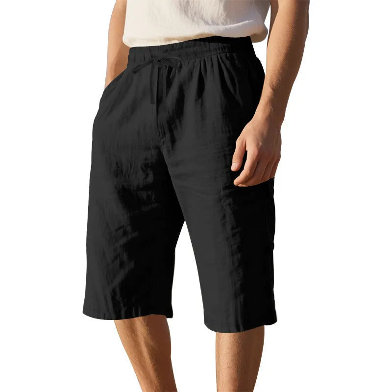 Men's linen shorts in light blue with drawstring waist and cropped straight-leg design