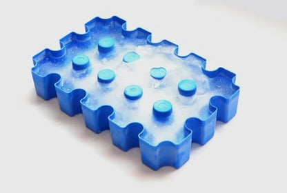 Blue plastic outdoor ice maker tray measuring 34cm long by 22cm wide