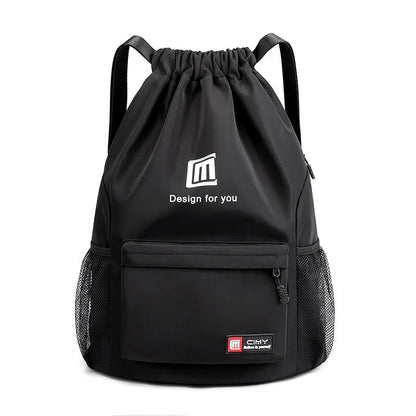 Large bucket-shaped travel backpack in blue with drawstring closure and soft black shoulder straps.