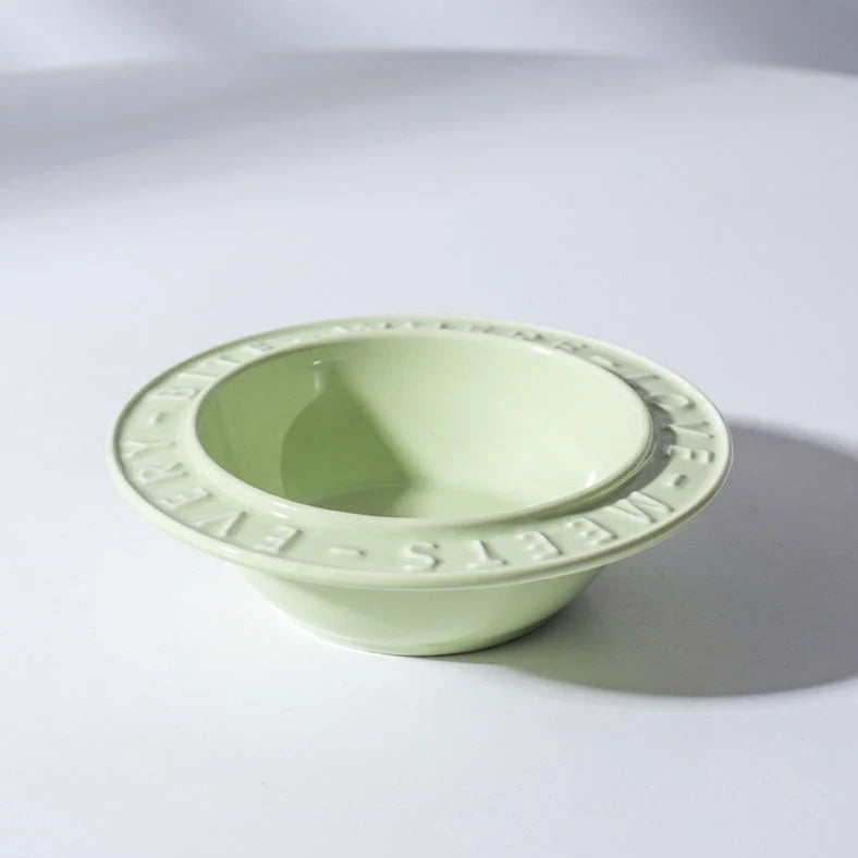 Ceramic cat bowl with iron anti-tip frame in blue colour with silicone pad