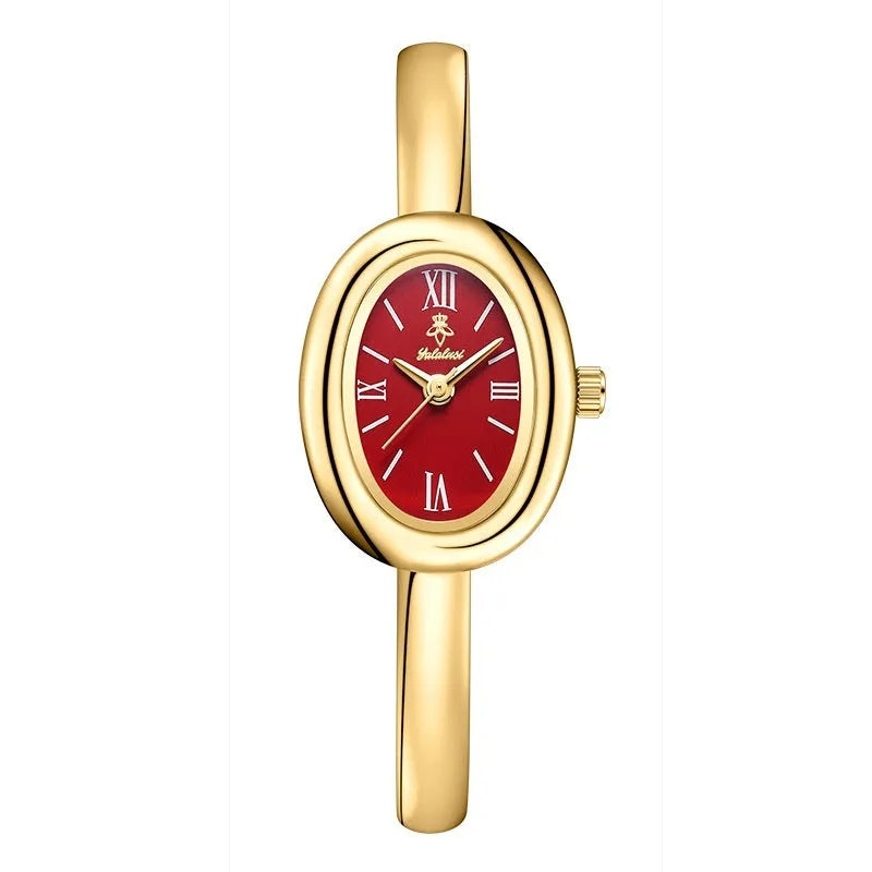 Women's oval retro quartz watch in gold colour with slim 8mm case thickness