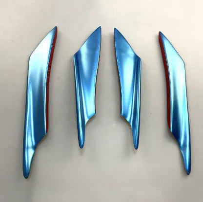 Set of four carbon fibre pattern ABS plastic bumper blades for car modification.