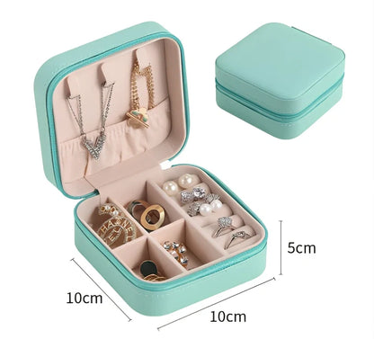 Portable jewellery box with flipping page display measuring 10×10×5.5cm in black colour