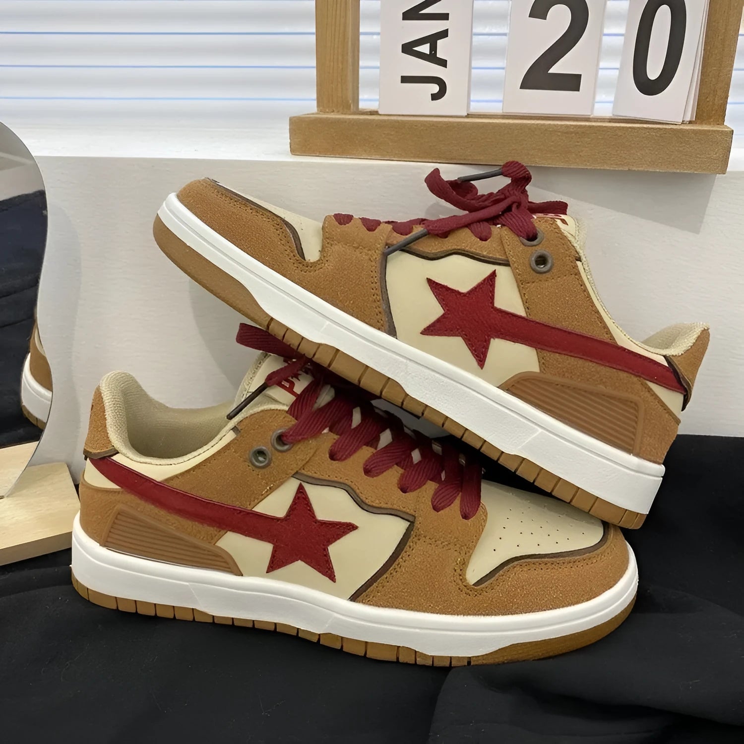 Brown women's platform sneakers with sequin trim and lace-up front